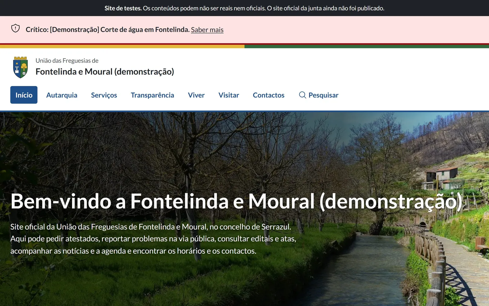 Página inicial do site de demonstração: aviso urgente em destaque, menu principal e uma fotografia da freguesia.